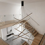 Modern black linear staircase chandelier with LED for tall foyer