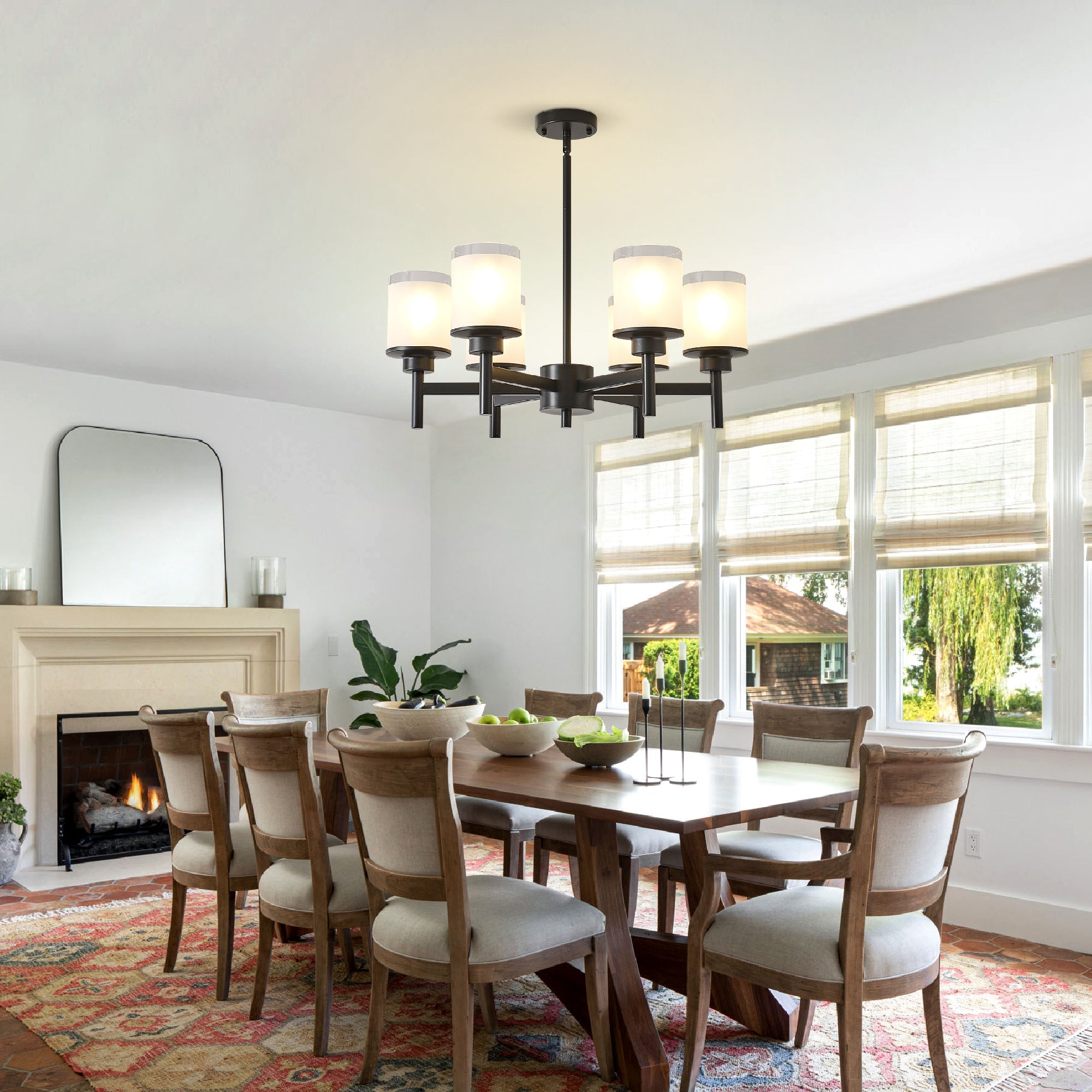 Clara matte black farmhouse chandelier in dining room setting above table