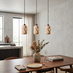 Tufa Calcified Stone Pendant Light close-up showing natural stone texture and warm light glow