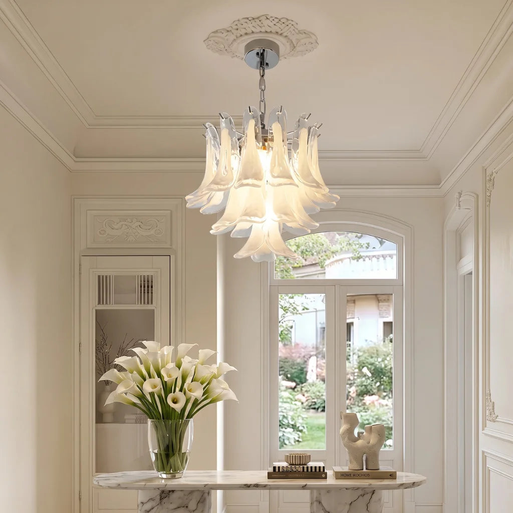 Calla chrome frosted glass tiered chandelier above dining table