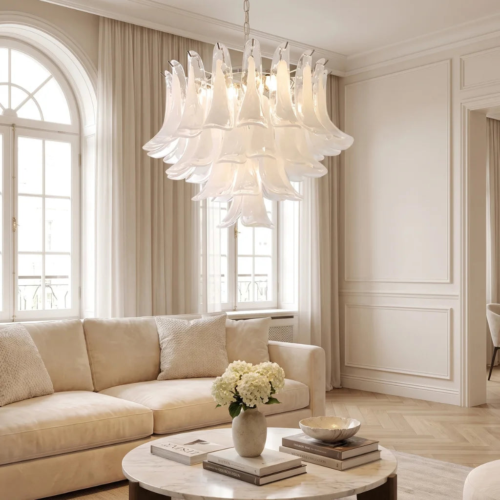 Calla chrome frosted glass tiered chandelier illuminated warm glow at night