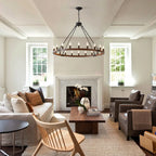 Ember wagon wheel chandelier in farmhouse foyer entryway