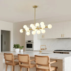 Vesper 16-Light Modern Farmhouse Pendant Light with Glass Shade in kitchen island setting