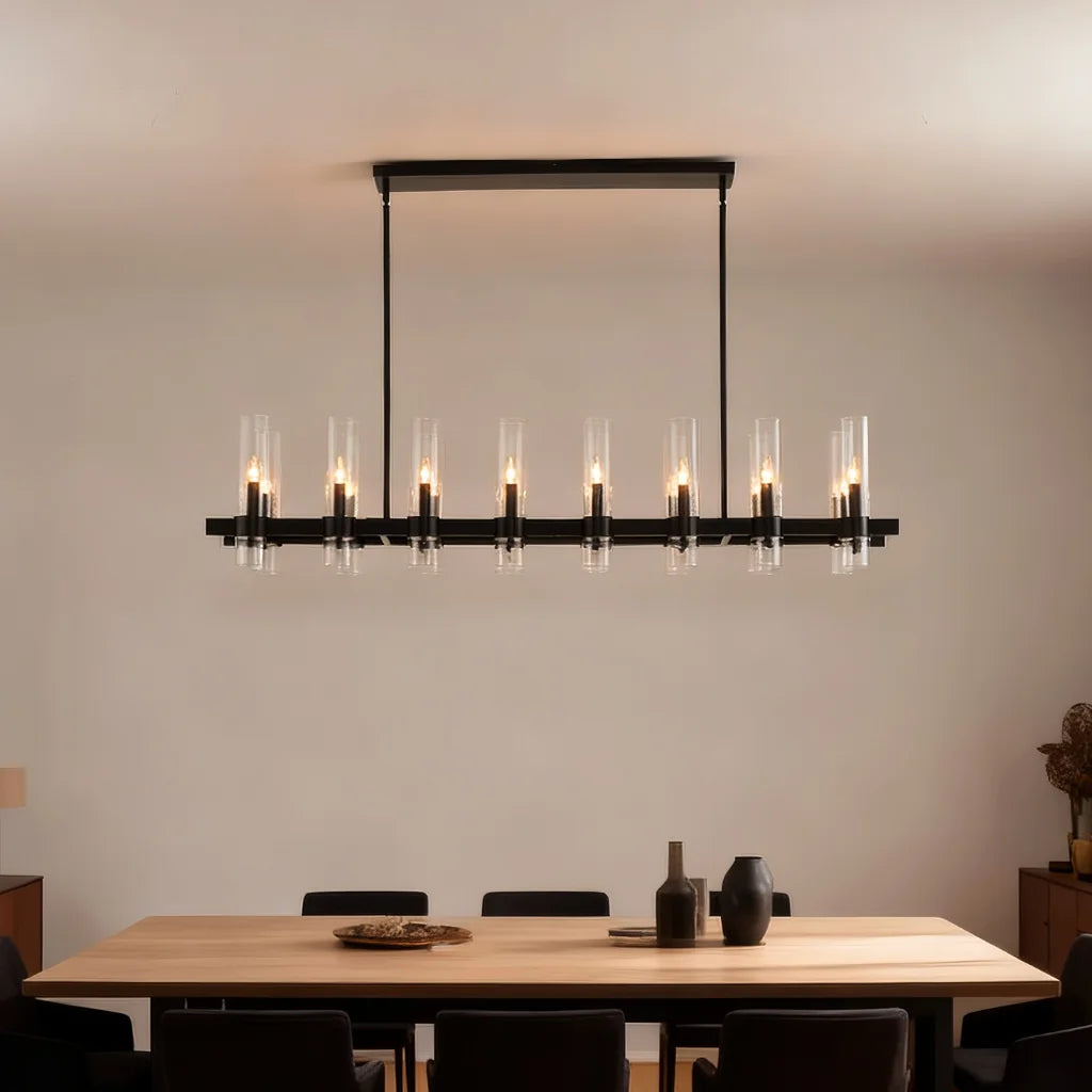 Aero matte black linear farmhouse chandelier in foyer entryway setting