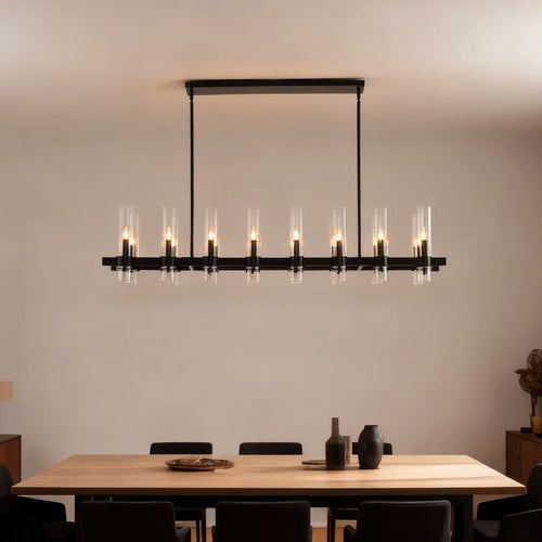 Aero matte black linear farmhouse chandelier in foyer entryway setting