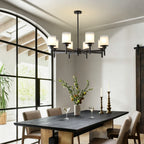 Clara matte black farmhouse chandelier in foyer entryway setting
