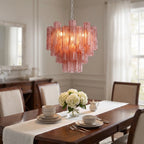 Tubular glass chandelier side angle view on white background