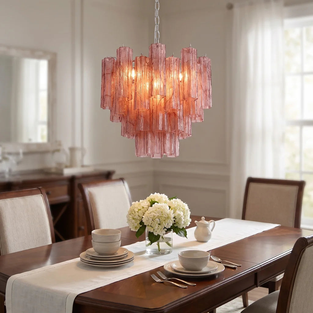 Tubular glass chandelier side angle view on white background