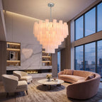 Tubular glass chandelier above dining table