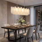 Tubular glass pendant light over kitchen island