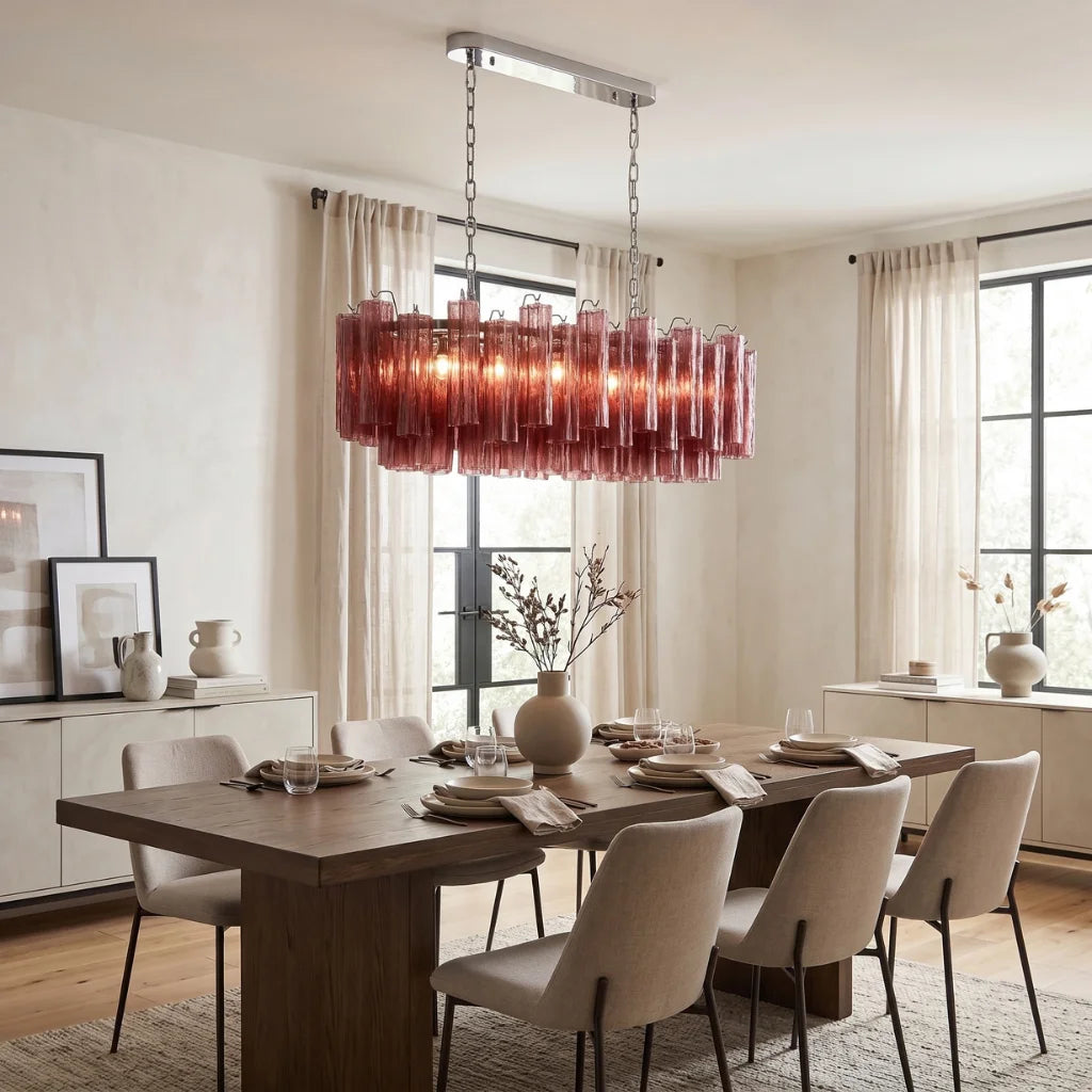 Tubular glass pendant light illuminated warm glow