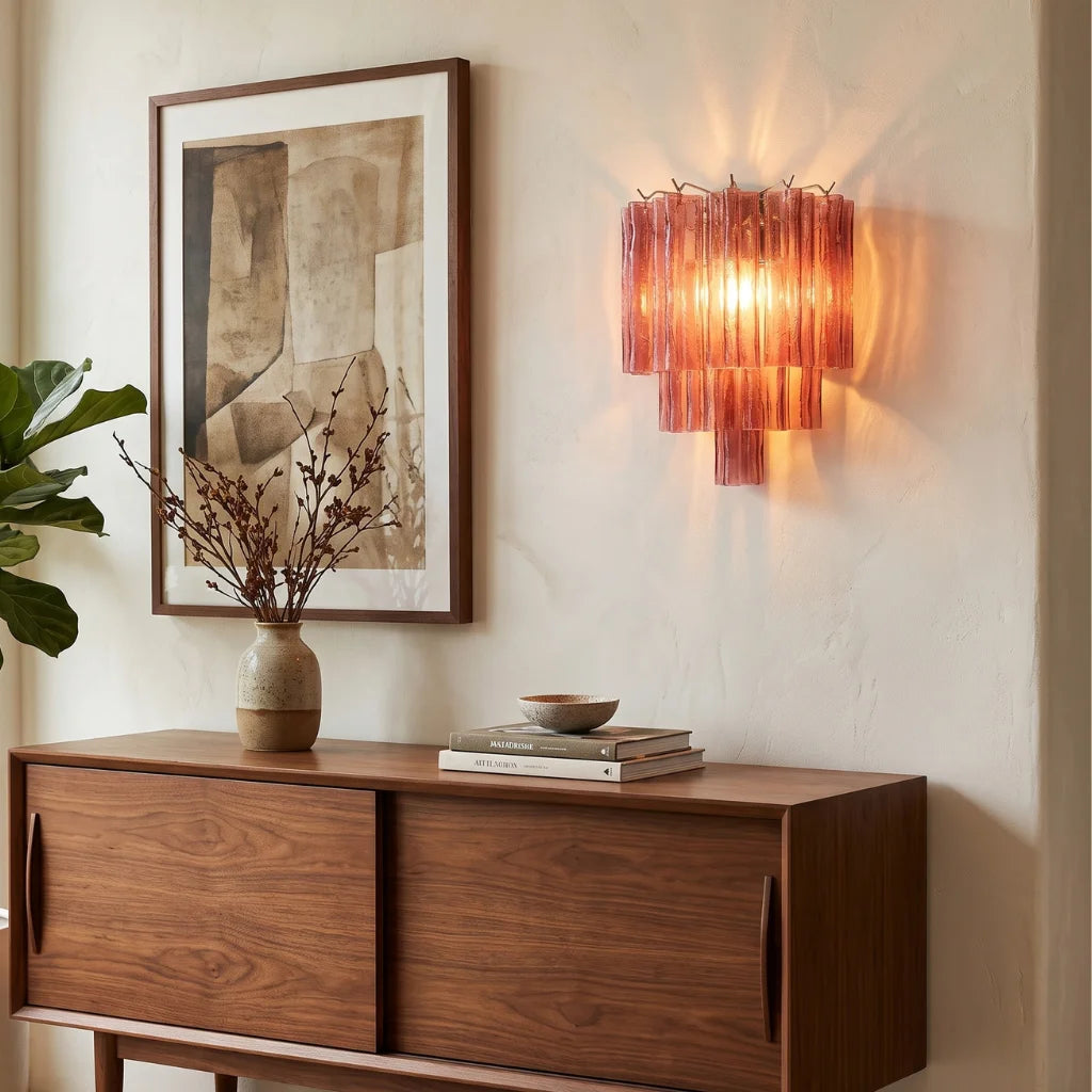 Tubular glass wall sconce chrome frame detail close-up