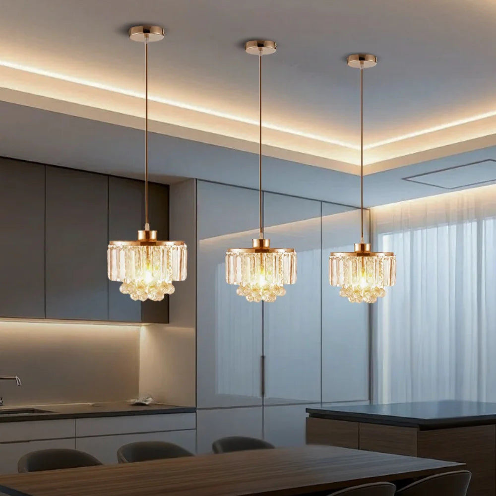 gold hanging light for kitchen island