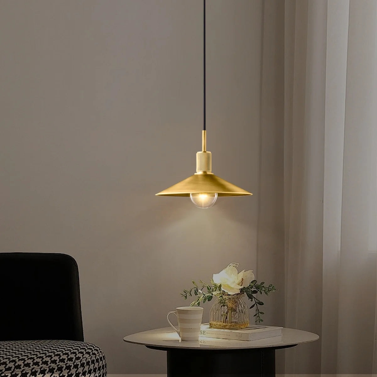 gold and black pendant light