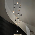large gold and black staircase chandelier